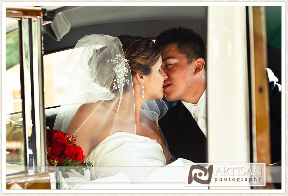 bride and groom leaving the church in vintage car