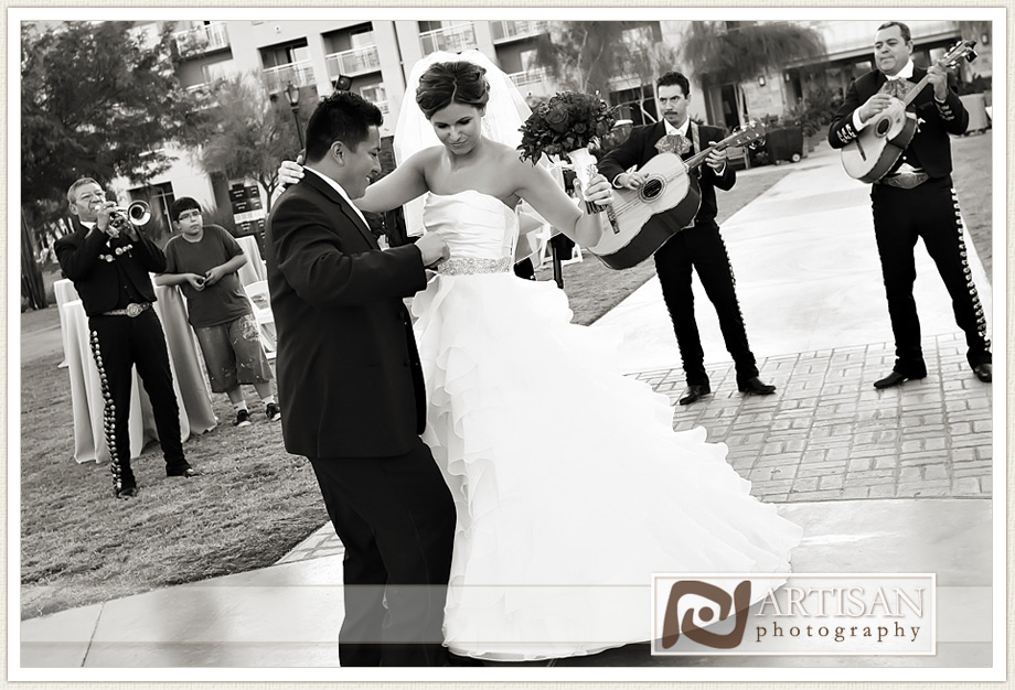bride and groom dancing with the mariachi band