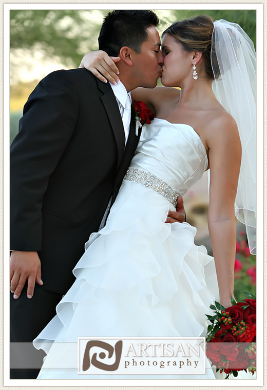 bride and groom kissing