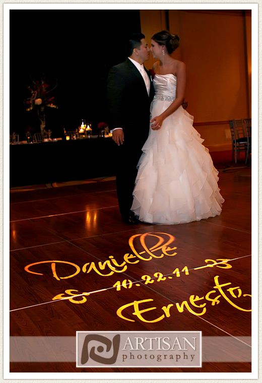 bride and groom dancing with gobo light
